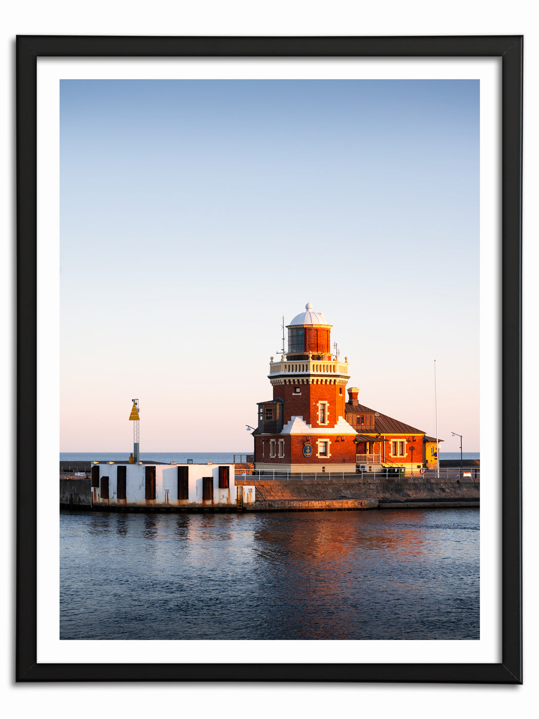 Morgonljus över Helsingborg Fyr och Lotshus