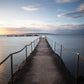 Solnedgång över badbryggan i Torekov