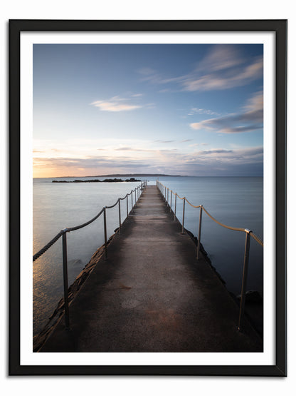 Solnedgång över badbryggan i Torekov